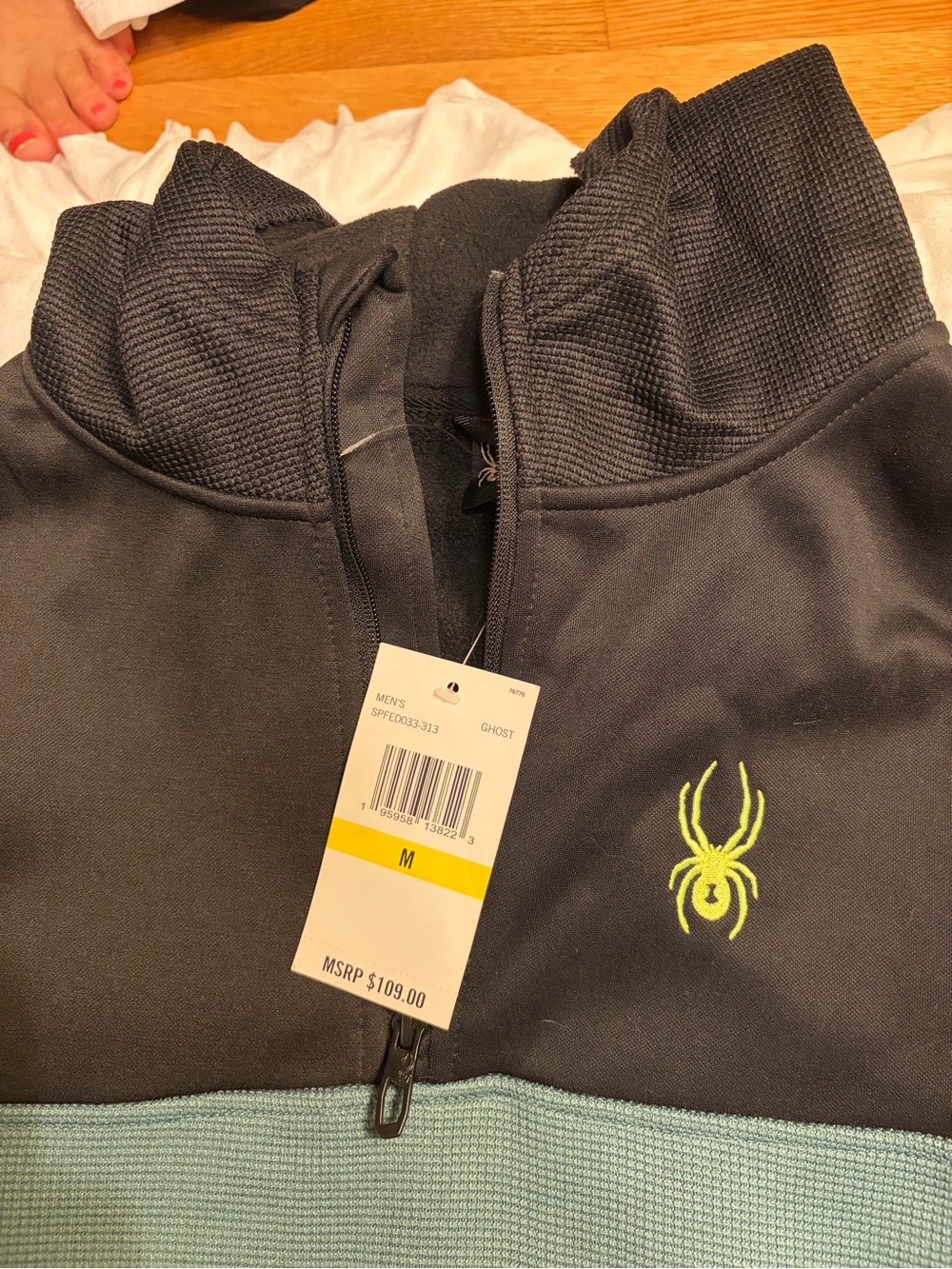 Spyder Men's Black and Light Blue Half-Zip Sweater with Neon Yellow Logo